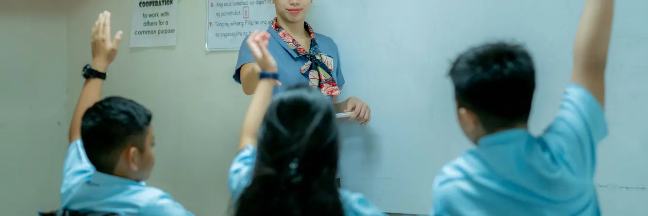 Education student teacher in classroom